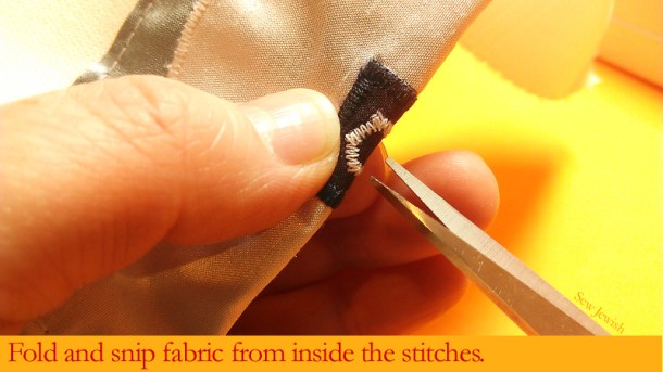 cut fabric for tzitzit holes