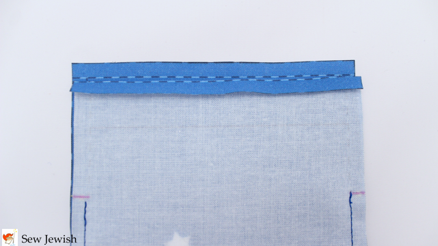 Fold top edge along dotted line - cell phone pouch