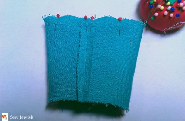 with right sides together pin along upper edge