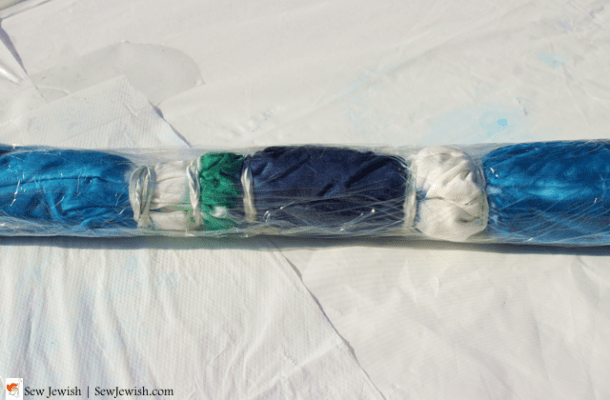 Dyed canopy wrapped in plastic close up